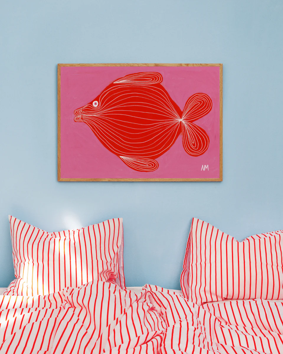 interior image of the "Fish's Pink Fantasy Poster" hanging on a blue wall in a bedroom