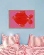 interior image of the "Fish's Pink Fantasy Poster" hanging on a blue wall in a bedroom