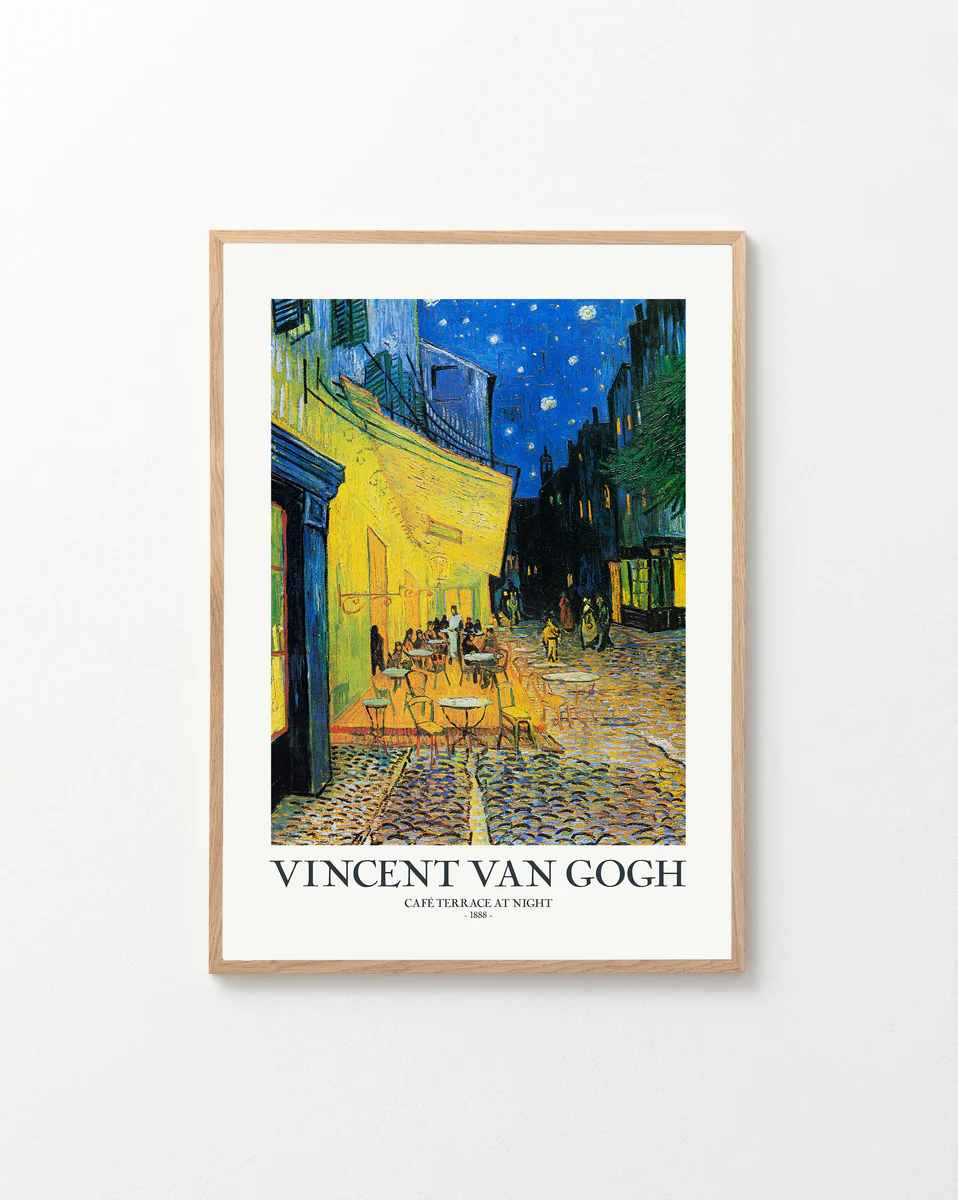 The Café Terrace at Night by Vincent van Gogh Poster showcases a well-lit café under a captivating starry sky, elegantly framed in light wood.