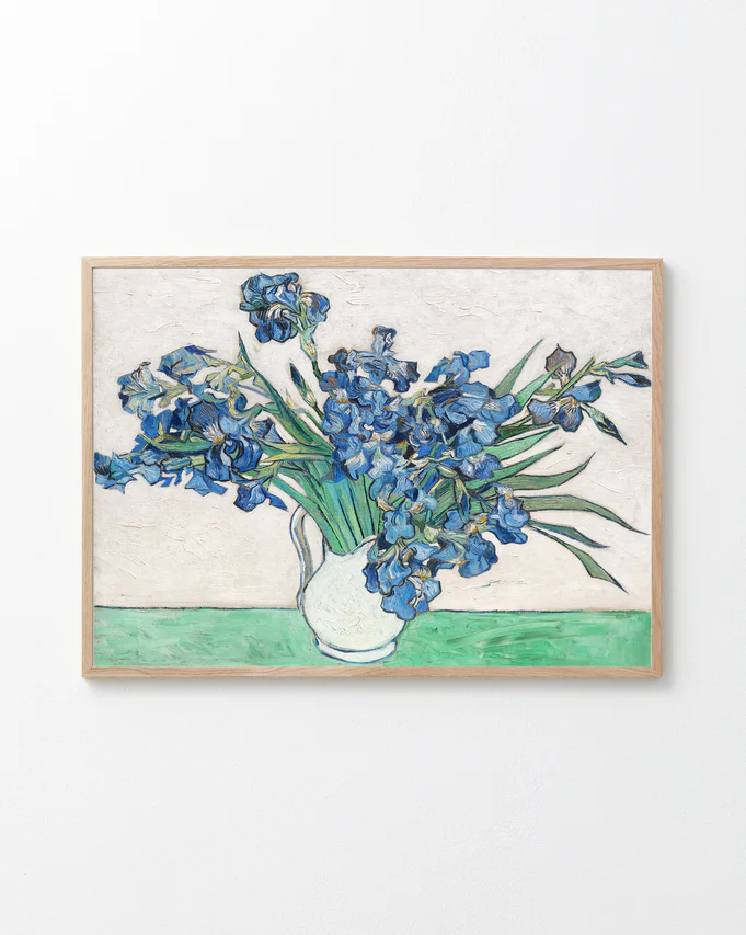 Framed artwork of Van Gogh's 'Irises' on a white background