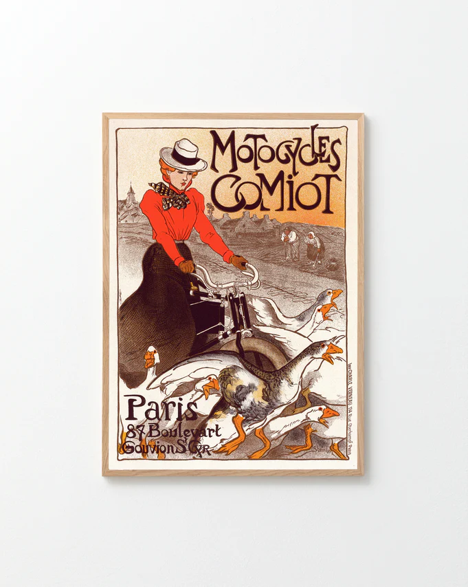 The vintage Motocycles Comiot poster by Théophile-Alexandre Steinlen features a person in a red coat riding a motorcycle among geese, enhanced by Art Nouveau text about Paris. Ideal for home décor, it exudes retro elegance.