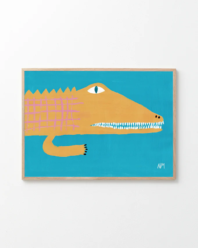 poster of a yellow crocodile on a blue background in a oak frame