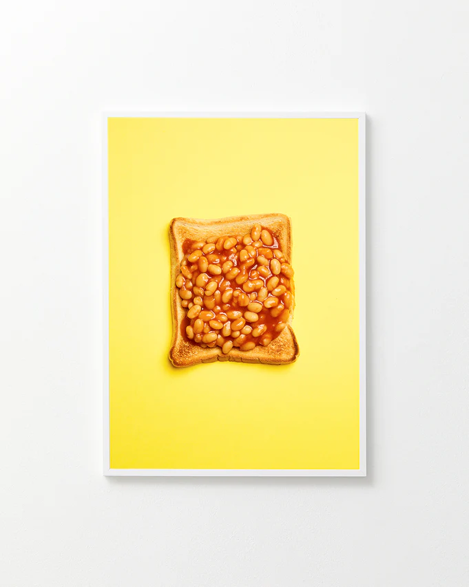 Poster "Baked Beans" in a white frame against a white background
