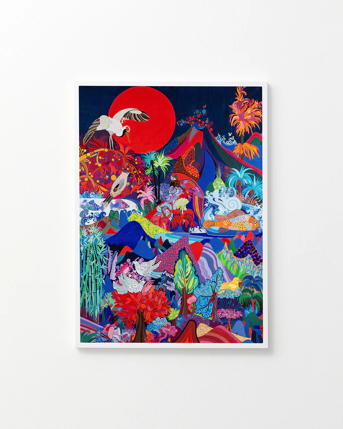 Framed poster on a white wall. The poster features a painting that shows a bubbling volcano next to a Japanese red-crowned crane, with birds, plants, water inlets, and fish below. Jean's collage-style blends countryside and jungle fauna and flora, with bays and beaches, resembling a tropical island. Many viewers say it looks like an island they'd love to visit, with its exotic beauty, vibrant colors, inviting waves, and cool birds.