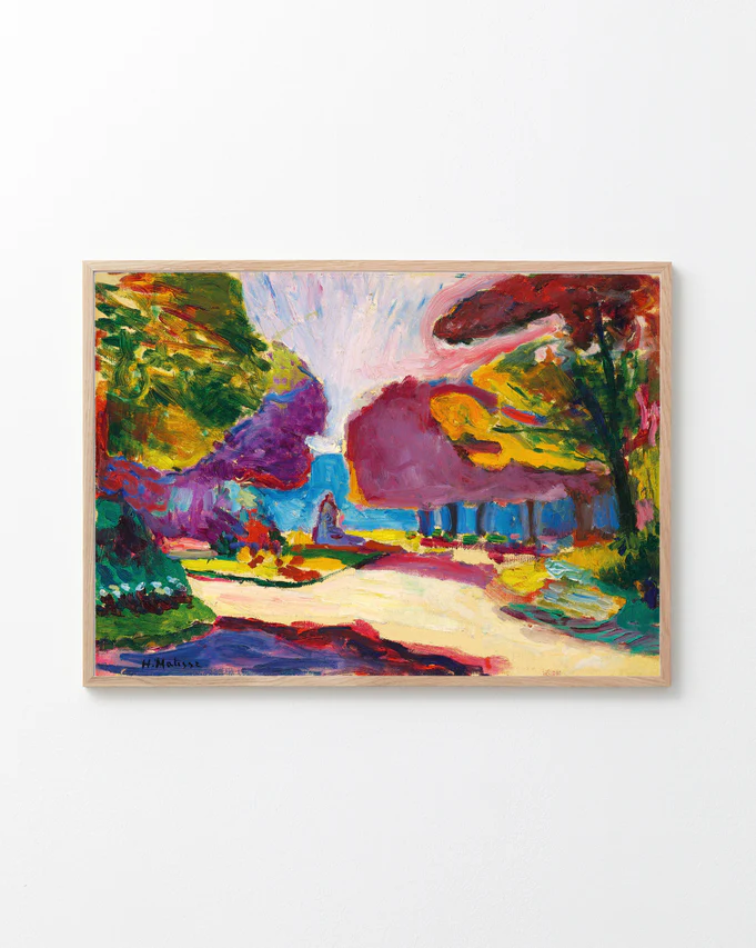 Framed colorful landscape painting on a white background