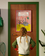 A Pippi Longstocking Pancake poster hanging on a door in a playful kids’ room.