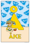 Pippi sits on the beach in front of a large yellow Å eating fruit. Name: Åke.