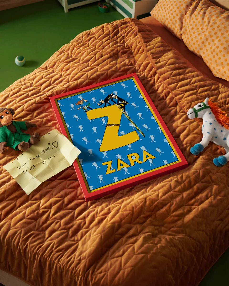Pippi Longstocking name poster with the letter Z and the name Zara, placed on a neatly made bed in a bright kids’ room.