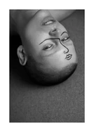 Bald woman lying on her back with a painted face upon her face.