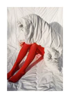 Woman in bright red stockings covered in a thick white down blanket.