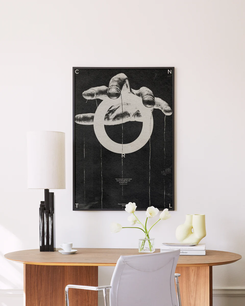 Hand holding strings like a puppet master and the word control spelled out.