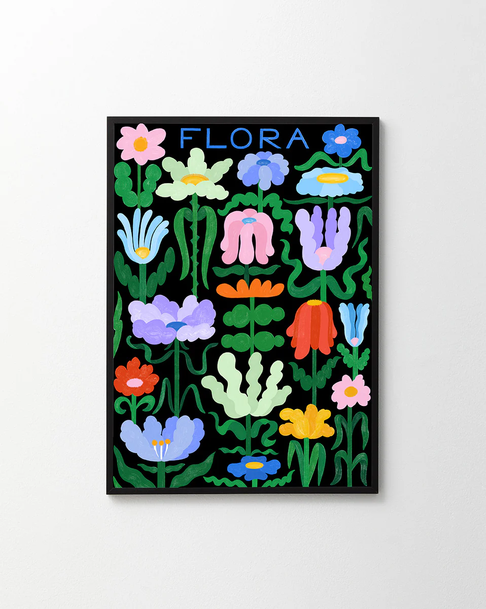 The Flora on Black Poster features a vibrant array of stylized flowers in pink, blue, green, and orange against a black background. FLORA is elegantly displayed at the top in handwritten blue typography.