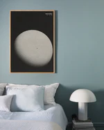 A black canvas with an almost full moon next to the word interstellar.