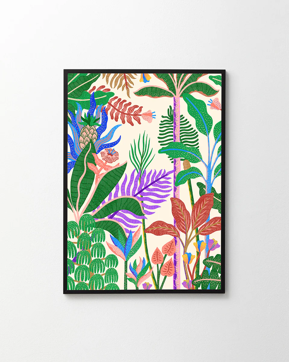 The Jungle by Day Poster showcases Manne Jalilians magical artwork with a vibrant botanical design. Lush green, purple, pink, and blue plant leaves create a lively jungle pattern against a light background, all framed in black.
