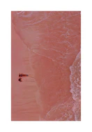 Pink beach with a woman and a child sitting on the shore.