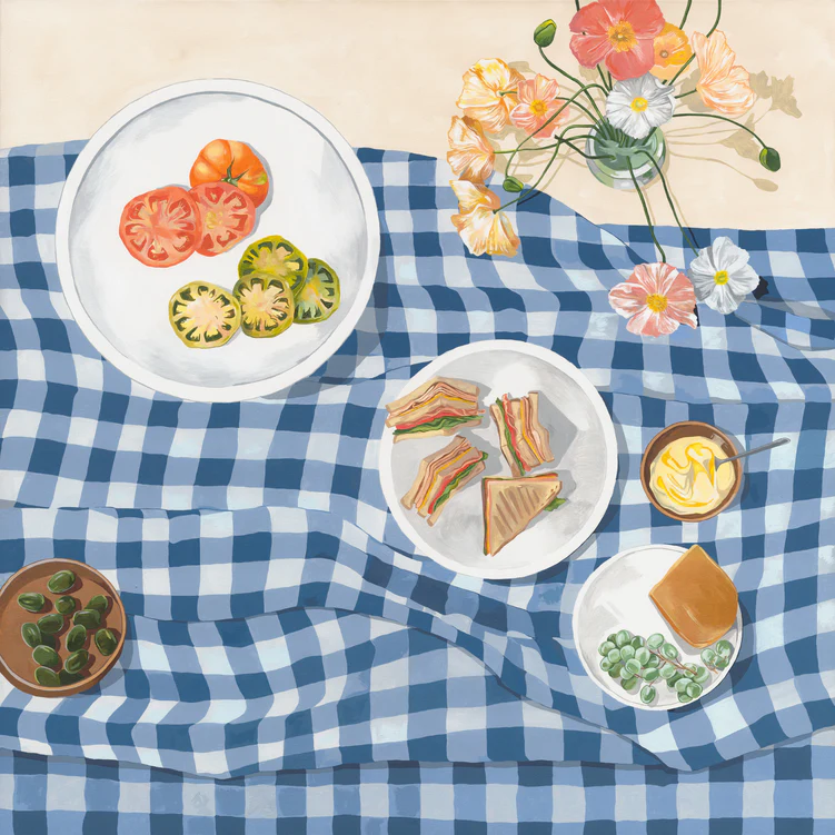 A vibrant picnic on a blue-checkered cloth evokes a summertime romance with plates of sliced tomatoes, colorful sandwiches, a flower vase, olives, and a loaf filled with beans. Its like a scene from the Poppies and Picnics Poster.