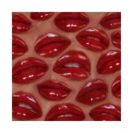 A pattern made from a bunch of shiny red lips. 