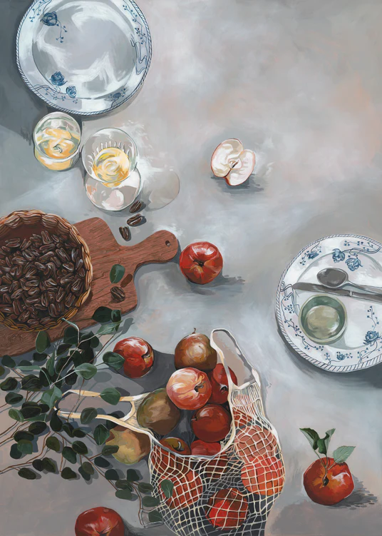 The How Do You Like These Apples Poster showcases a kitchen table adorned with vibrant red apples, a cutting board with pecans, plates, spoons, glasses of lemon slices, and a net bag of apples. A sprig of green leaves and sliced apple add the finishing touch to this warm decor.