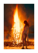 Woman dressed in white standing in front of a blazing bonfire.